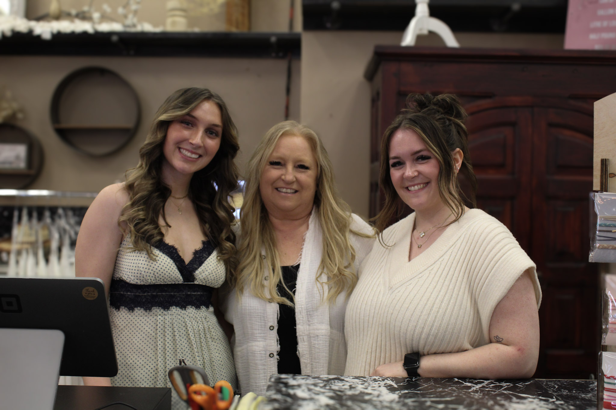 Owner with her daughters